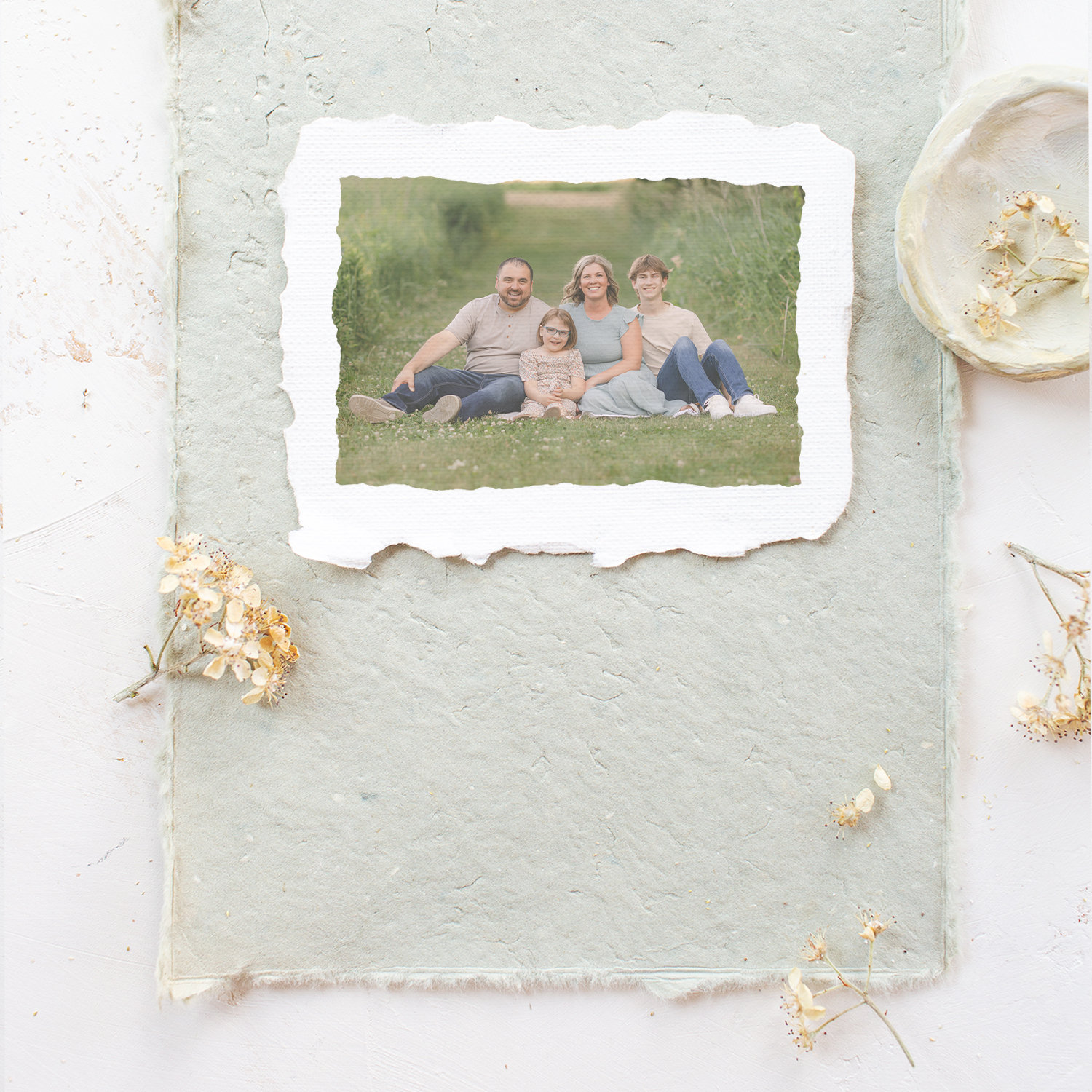A summer family photo on hand torn paper