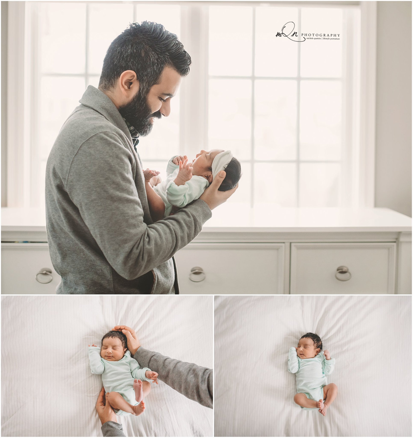dad holding newborn baby