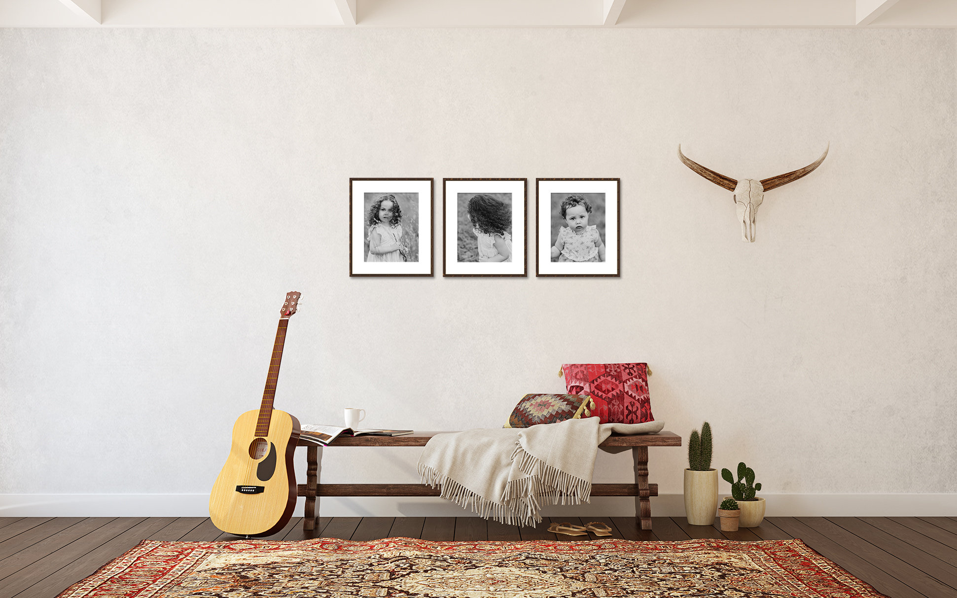 3 black and white framed prints in hallway
