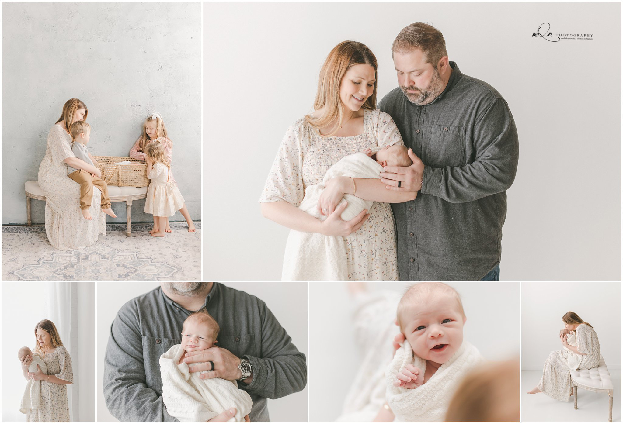 parents holding newborn in a studio setting