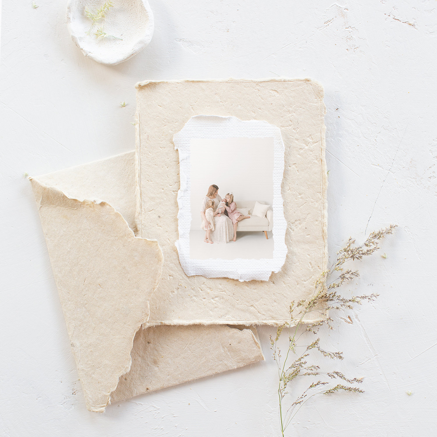 handmade paper print with a newborn image on it