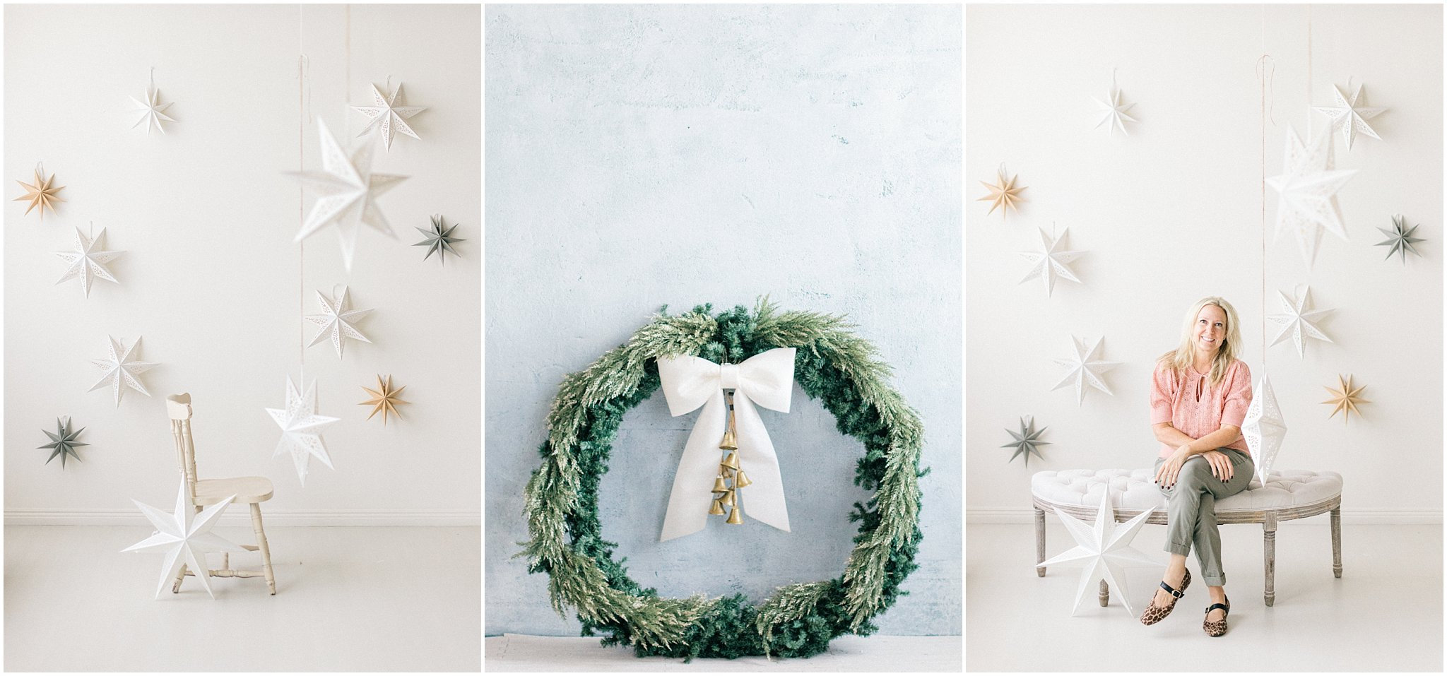 A cozy holiday scene featuring a green wreath with a bow and a decorated backdrop, showcasing a woman sitting nearby.