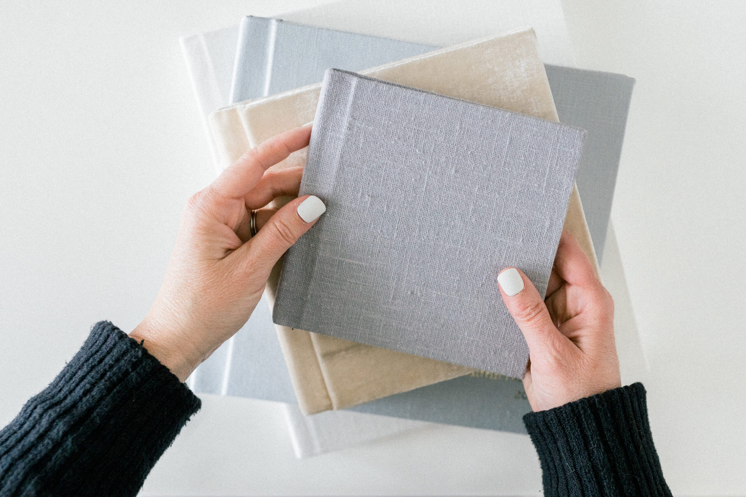 Tiny pages, big smiles. Discover why pocket books are a favorite heirloom photography product for families in the Twin Cities.