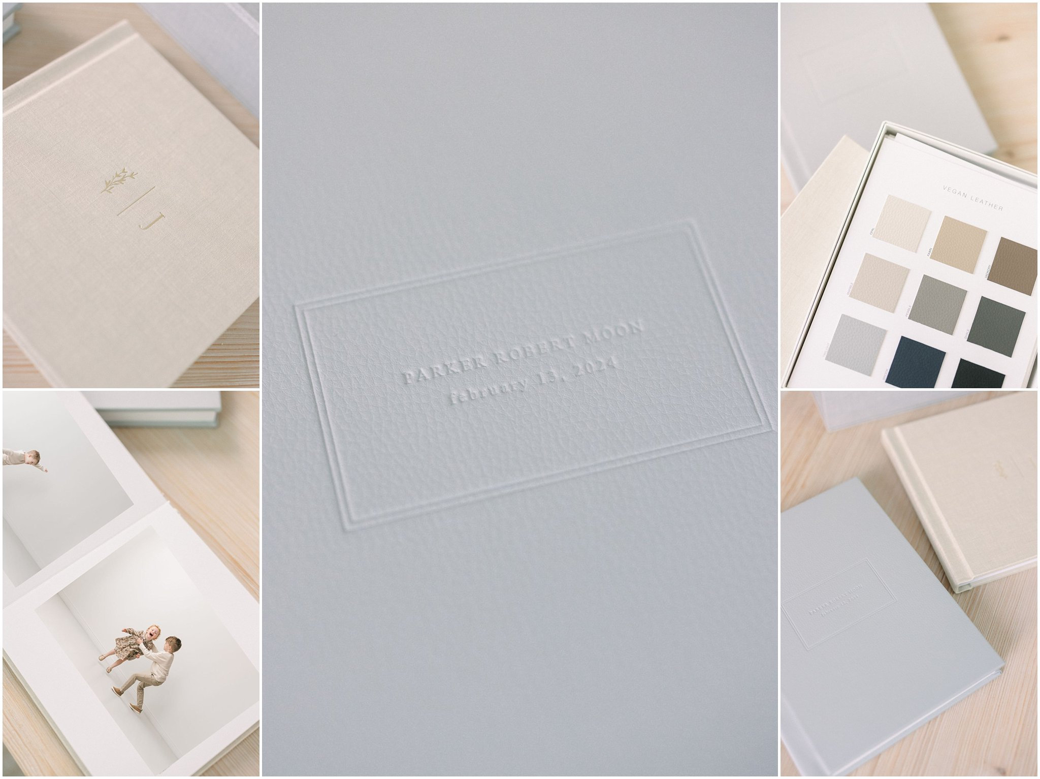 A flatlay of a closed notebook, a color palette, and a photo book with a small photo on a light surface.