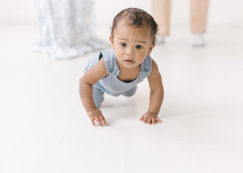 Minneapolis baby photographer capturing simple studio milestone photos for baby boy