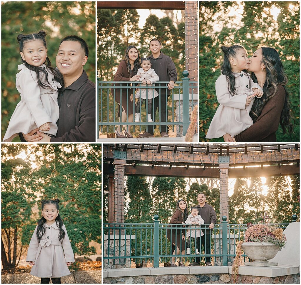 Parents and daughter posing by a railing during a Twin Cities fall family photo session.