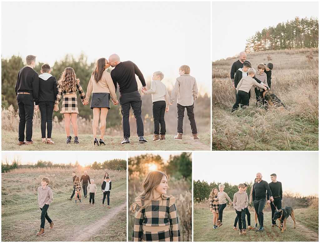 Family walking through a grassy field with their dog during fall family photos in Minnesota.