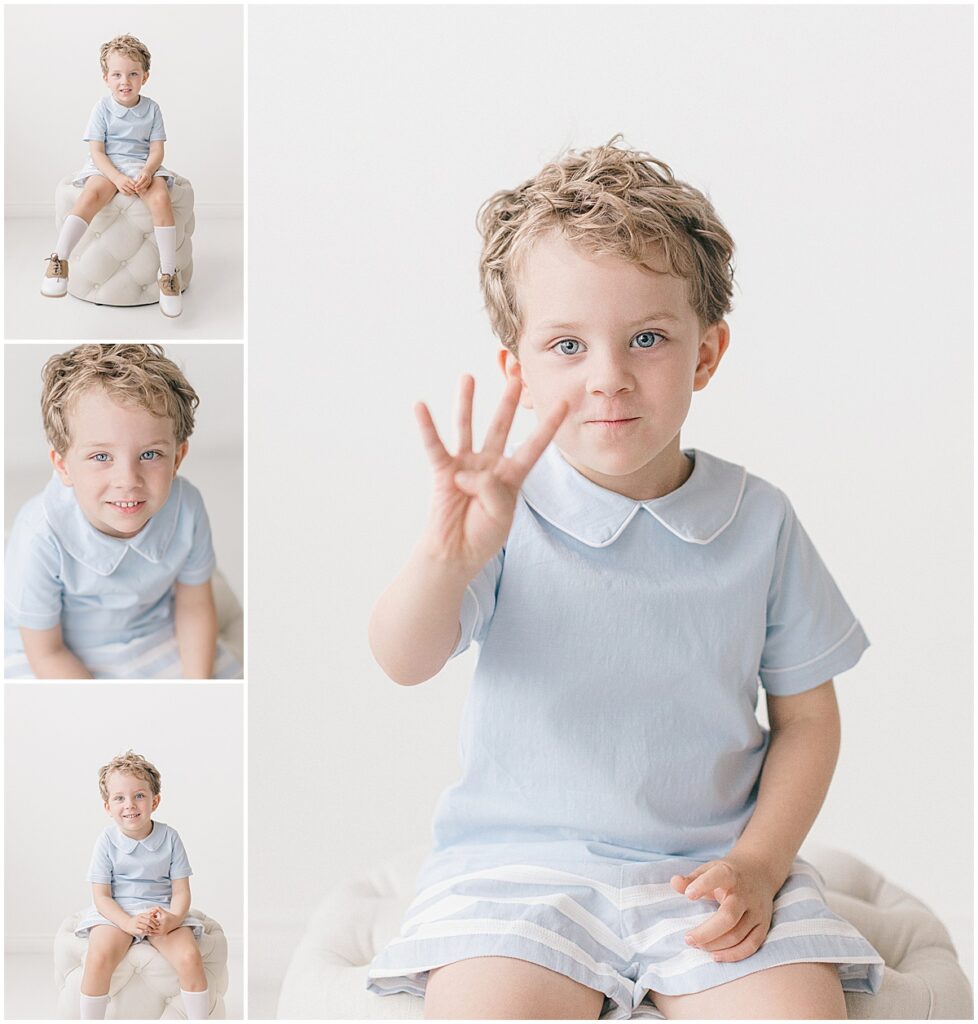 Milestone photos of a four-year-old boy holding up four fingers and sitting on a cream studio ottoman