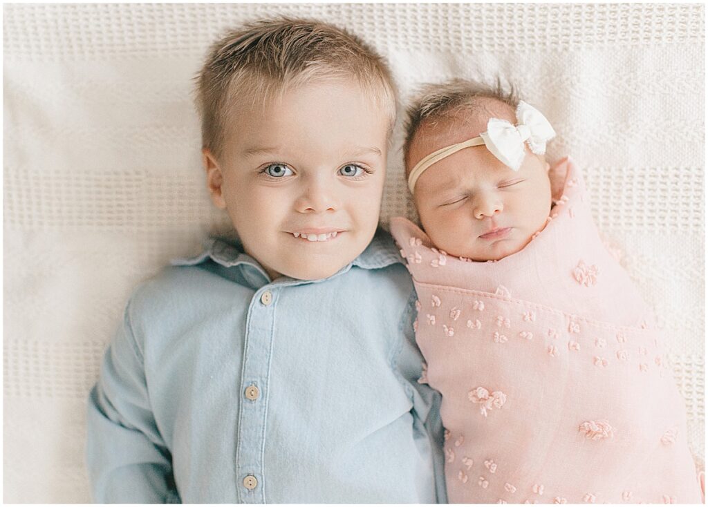 newborn photography session with a three-year-old sibling in Minneapolis- Newborn Photography with Siblings