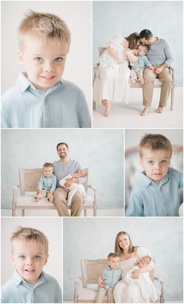 Older brother portraits and family photographs with a newborn against a soft blue wall in a Minneapolis photography studio.