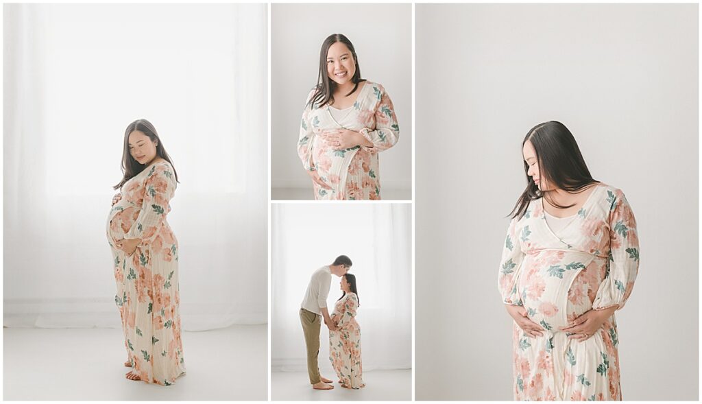 Pregnant woman in a pink floral dress posing alone and with her partner in a bright studio.