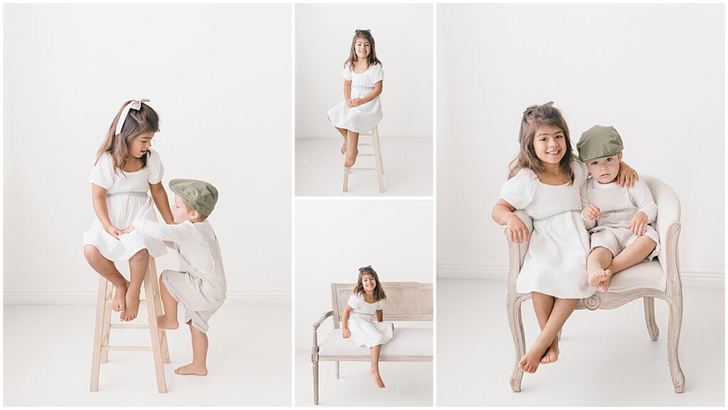 Brother in a green cap and sister in a white dress on a wooden stool and French chair in a natural-light studio in Northeast Minneapolis